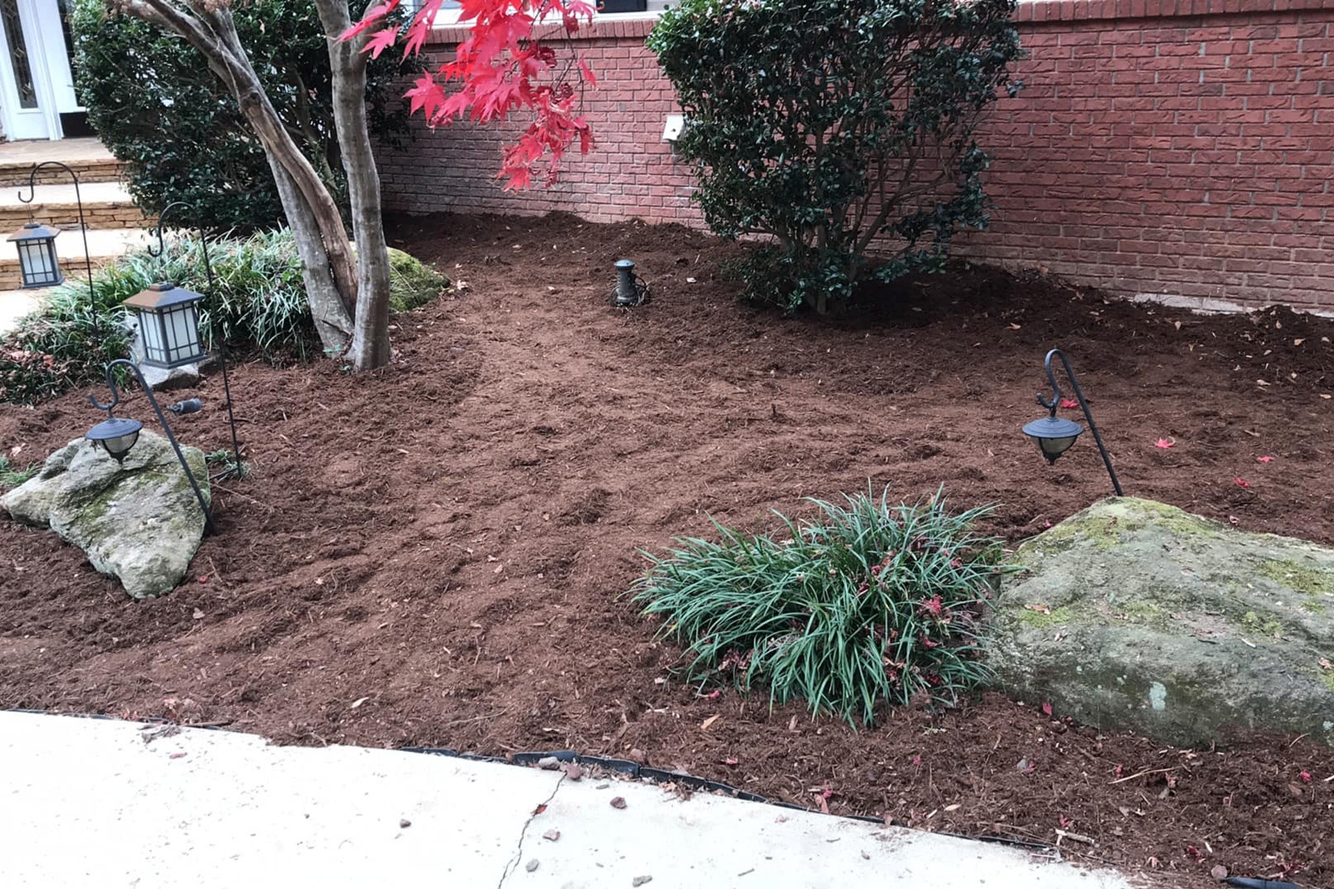Beautifully landscaped home with fresh sod and mulch beds in Seneca, SC
